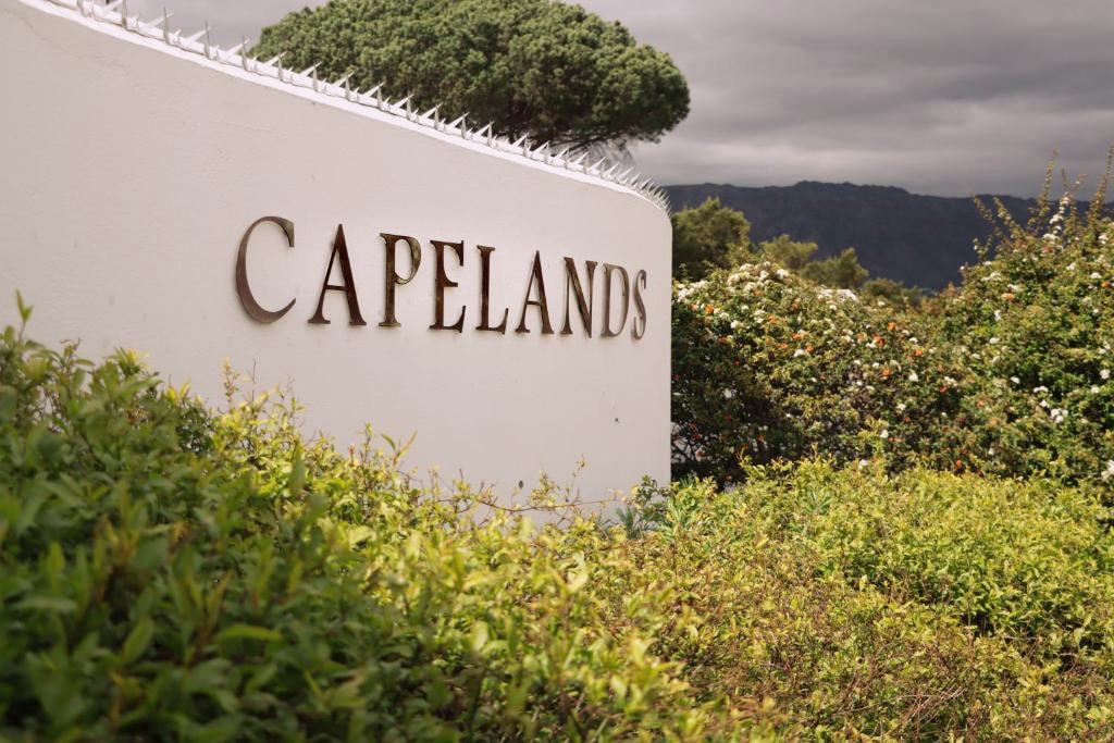 The Capelands name on the white entrance wall